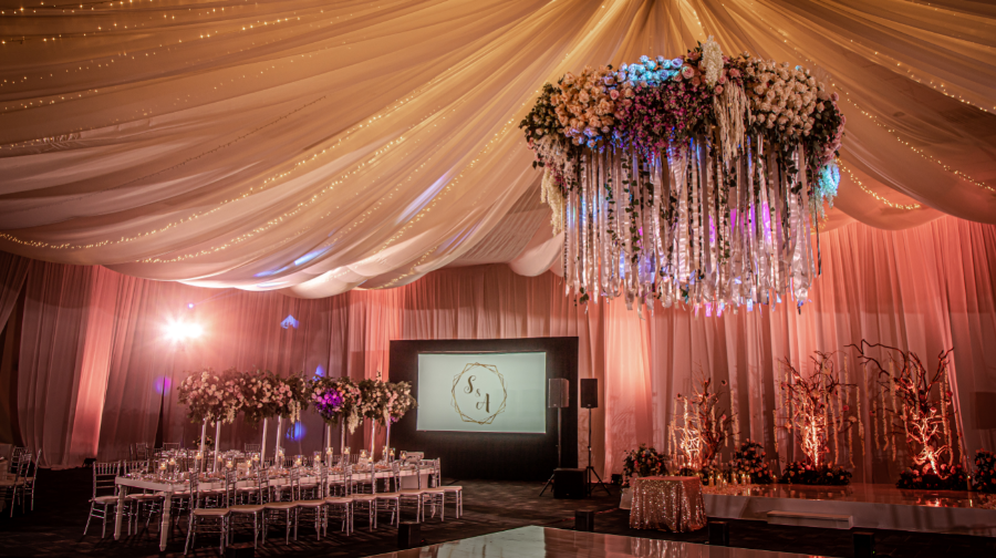 Ballroom_floral_chandelier_with_ribbons_and_drapes.PNG